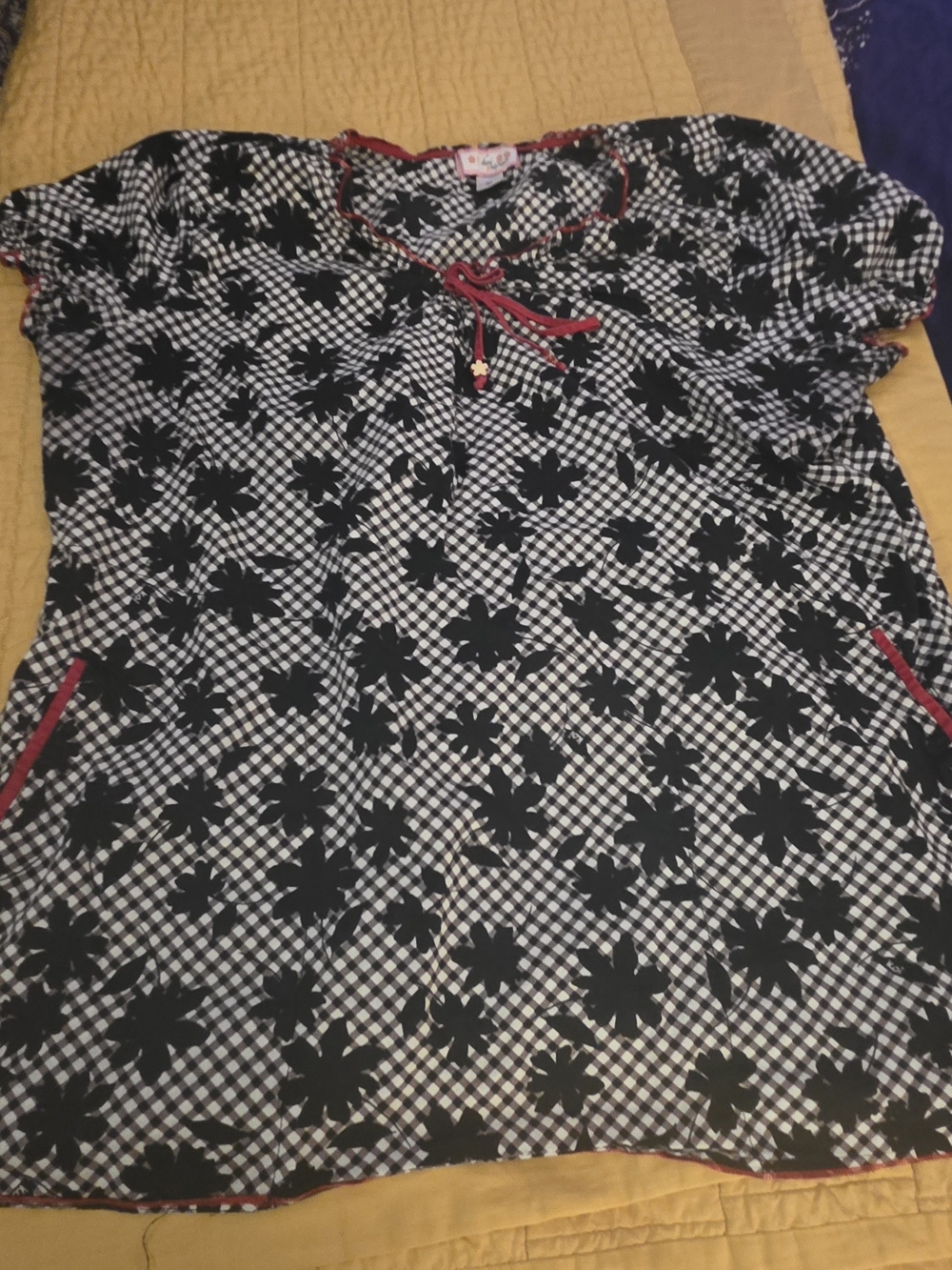 Koi by Kathy Peterson black and white floral-print scrub top featuring red trim